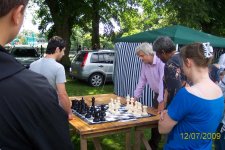 Peter Broomhall playing with  giant chess set.  Colin Haughton on right pondering at Wolverhampton Show Sun 12 July 2009